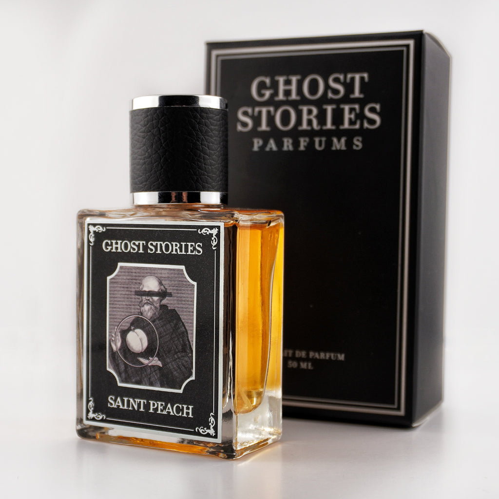 Perfume bottle and packaging of 'Ghost Stories Saint Peach' on a white background